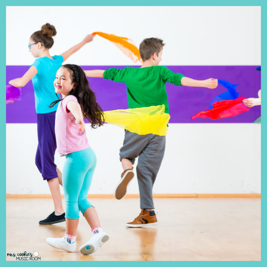 Kids moving around with colorful scarves  spring-movement-activities-for-music-class